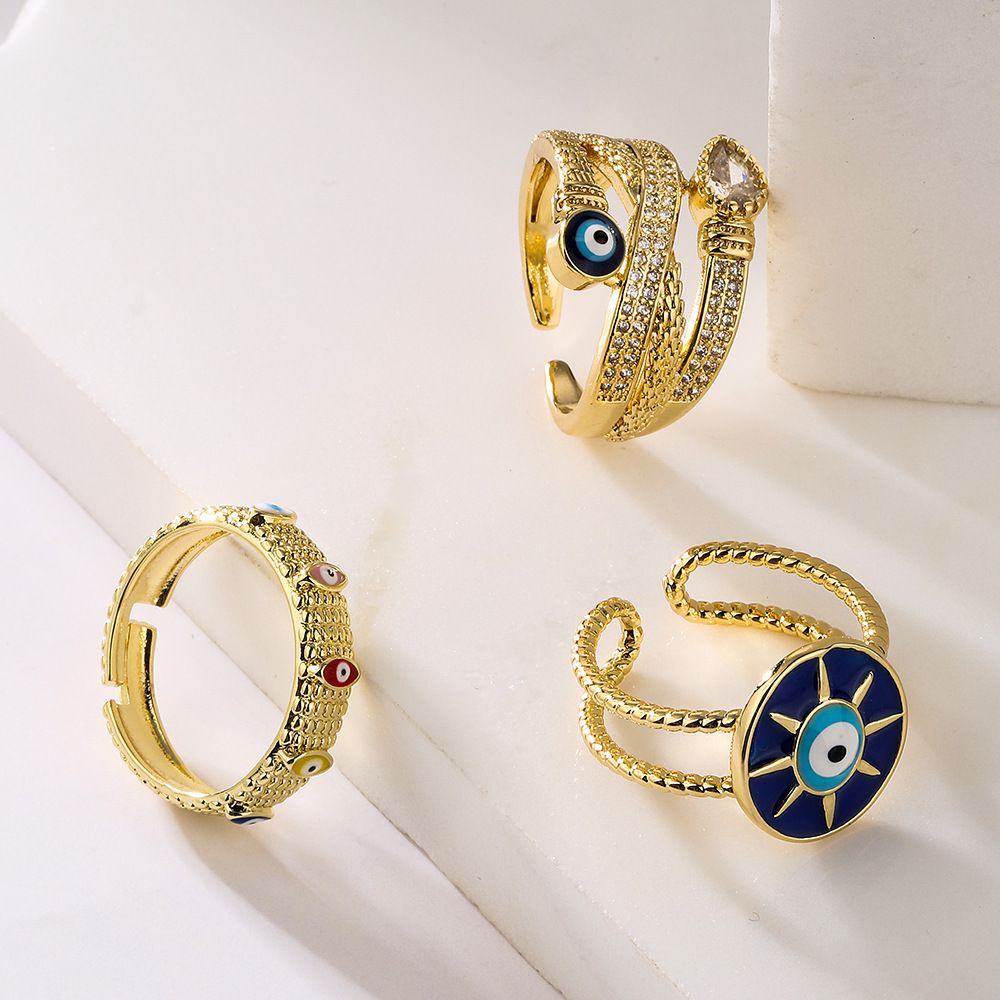 Copper Plated Real Gold Zircon Dripping Eyes Geometric Opening Ring Female